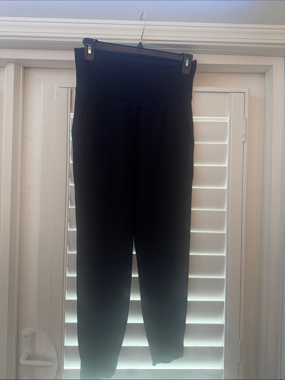 Woman’s black sweat jogger pants with pockets
